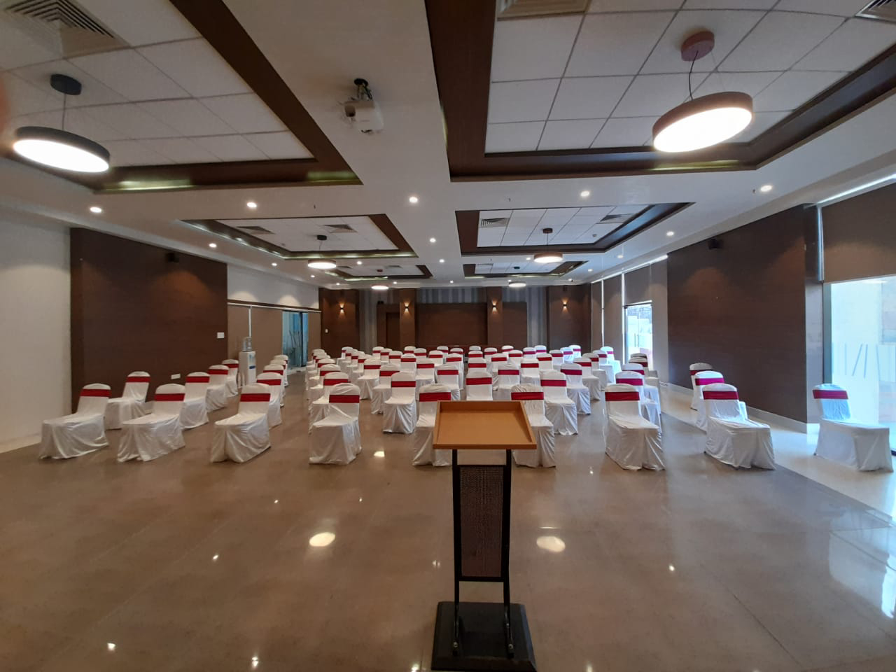 Conference layout with screen and seating.